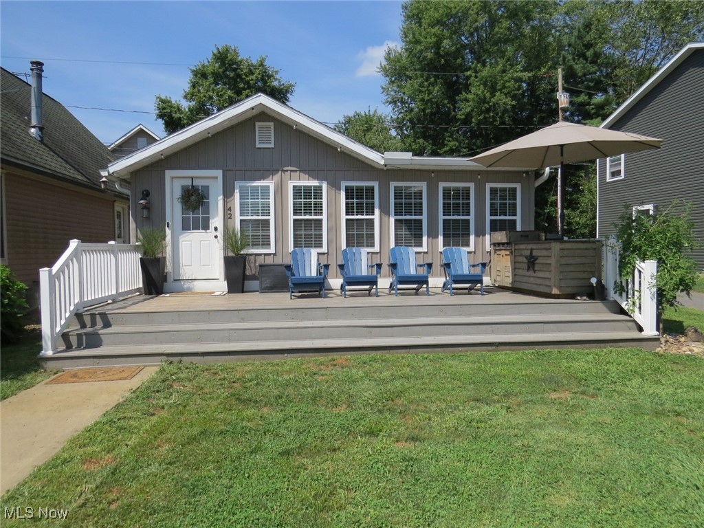 Summer days can last all year in this stunning 3 bedroom lakeside ranch. Enjoy the views of this Luna Lake community on your spacious front deck or head down the street to the beach for swimming and fishing along with a picnic pavilion, clubhouse, baseball diamond, playground and woods and trails to explore. This one story home features a beautifully updated great room with built-in bookcases, TV, fireplace and drop zone, open dining room and kitchen with white cabinets and newer counters, nice full bathroom with plenty of cabinets and first floor laundry. Many updates & lots of love in this home! Hurry on this one and vacation all year round!