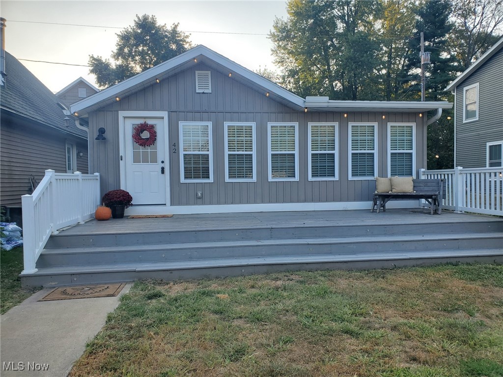 Fall in love with this stunning 3 bedroom lakeside ranch. Enjoy the views of this Luna Lake community on your spacious front deck or head down the street to the beach for swimming, fishing & boating along with picnic pavilions, a clubhouse, baseball diamond & playground. This one story home features a beautifully updated great room with built-in bookcases, fireplace and drop zone, open dining room and kitchen with white cabinets and newer counters, nice full bathroom with plenty of cabinets and first floor laundry. The many updates include a tankless hot water heater, furnace, electrical and plumbing. Vacation all year round in this home!