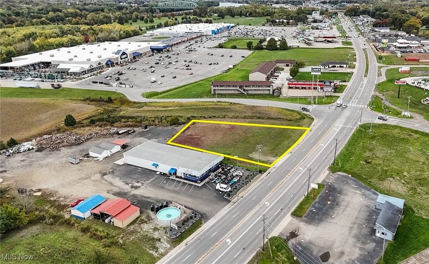 .91 level vacant acres land in high visibility, high traffic area of Marietta, Ohio. Located from the third street-light off of I77, property is close to hotels, restaurants and other businesses in the area recently built, which includes Texas Roadhouse and Wash-Rite Carwash. The adjoining River's Edge Shopping Center, located on banks of the Ohio River, boasts anchor retail strength unmatched in the market area. Not only does it include Walmart Supercenter but is also home to Lowe's and 43,594 sf of premier national retail and restaurants serving this strong market. If needed, there is additional 1.25 adjacent acres, see MLS #5079296.