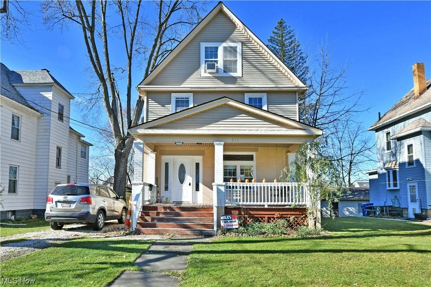 Masterfully renovated with three floors of stunning, move-in-ready living space; this fantastic Niles home packs remarkable surprises at each level! Packing plenty of curb appeal, the attractive outward appearance is complimented by its inviting, covered front porch with a porch swing. Around the back, a fenced-in yard includes a stone patio, play area, and a detached garage with side road access. Through the decorative glass front door, the expansive living room explodes with natural light, showcasing the main stairway as natural hardwood flooring spills into the nearby kitchen and dining areas. A recessed shelf window cascades sunlight inside while you enjoy your meal, illuminating the kitchen as stylish crown molding runs overhead. Stainless steel appliances help to brighten the kitchen with the recessed lighting. Around the corner, first-floor laundry joins a lovely half bath and rear patio access. The carpeted stairway lends to a trio of second-floor bedrooms along with a lavish full bath. Inside the large closet-lined master suite, a second full bath includes a dual vanity and stall shower. At the third level, an impressive family room that makes for an easy extra bedroom completes the package. A full basement presides below. Updates include: All windows and exterior doors, vinyl siding, roof, flooring, furnace, hot water tank, plumbing, lighting fixtures, 200amp electric service, garage door all in 2015, and air conditioning in 2016 plus a one year home warranty!