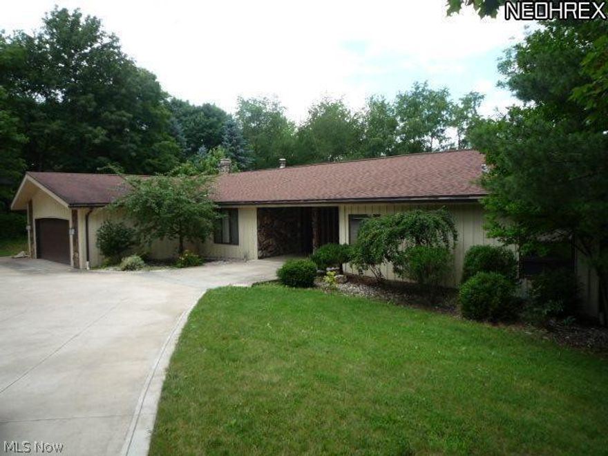 Waterfront Property! Enjoy the view all day from various rooms. Very open floor plan. Extensive Kitchen remodel with built in appliances. Walk out basement. Oversized Deck. This is a private development.  Needs some work, but very unique. This property is now under auction terms.  This property is subject to a 5% Buyer's premium pursuant to the Auction Terms & Conditions (minimums may apply).  All auction assets will be sold subject to seller approval.