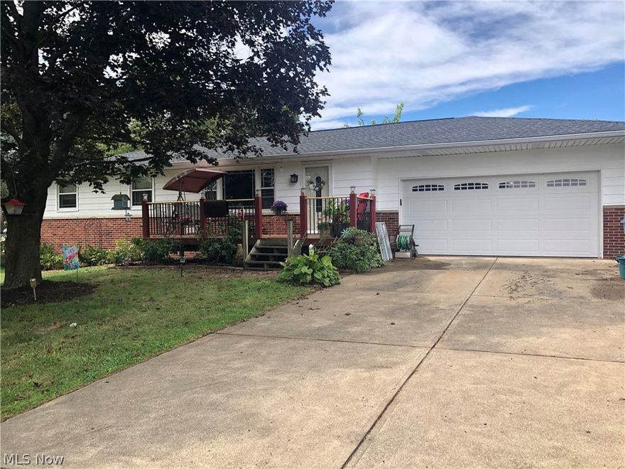 Welcome home to this serene oasis! Peace and quiet is all you hear around here. Nestled on just over 1 acre of flat land this 3 bedroom 2 bathroom ranch meets all your needs. There is a deep 2 car attached garage with a large extended workshop in the back. Inside is a completely remodeled first floor. The kitchen is custom made amish cabinets with stainless steel appliances, double ovens, new flooring throughout. The bathroom has been remodeled and has double sinks and a walk-in shower. The living room is spacious with plenty of room for family and guests. The master bedroom have been remodeled  and has a sitting area and fits a king size bed. It has 2 large closets. The second bedroom has beautiful hardwood floors and a large closet. Downstairs is a finished additional living space with laminate floors and a full bath with walk-in shower. The 3rd large bedroom is in the basement. It has a built-in nook for the bed, closet and additional space for whatever you need! Off the rec. room i