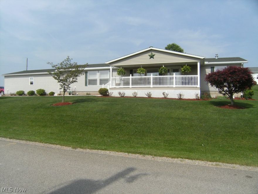 The quiet neighborhood of Branch Circle is home to this immaculate 4 br 2 ba home in the East Muskingum SD. This home features an open floor plan concept which is further enhanced by vaulted ceiling throughout the home. The ample living room provides space for large family gathering and is open to the dining area. The well-equipped eat in kitchen has plenty of counter space, beautiful oak cabinets, sunlit breakfast room and a convenient laundry area. The master suite features a remote control ceiling fan, a walk-in closet and a full bath with double vanity. The three additional bedrooms are located at the opposite end of the home for increased privacy and are served by a second full bath.  A magnificent sunroom at the back of the house provides access to the  patio and optional hot tub. Enjoy the neighborhood from the covered front porch which has an attractive railing system, canned lights and a porch swing. Home also has an attached oversized 2 car garage and a storage building.