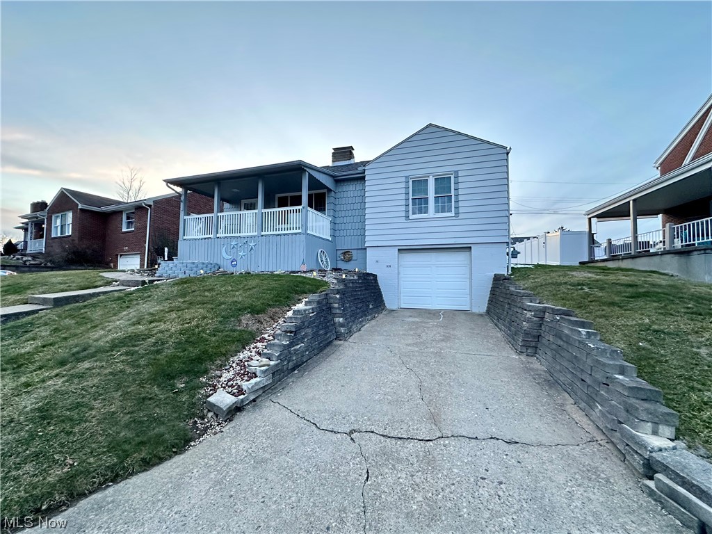 Perfect one-level starter home available on Scenic Drive! 331 Scenic Drive may be small, but it is extremely well kept! The main level features a large eat-in kitchen, living area, full bathroom, and two bedrooms. The lower level features the one-car garage, laundry, and an unfinished area that could be used for storage or additional living space! This home also features covered front and back porches, as well as a nicely sized backyard perfect for pets or hanging out! Roof, furnace, AC, windows and garage door were all updated in 2011. Kitchen flooring replaced 2018. Original hardwood flooring throughout most of the home that is in spectacular shape! Call now to schedule a private showing!