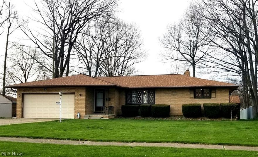 DO NOT MISS OUT!!!  Three bedroom 2.5  bath brick ranch avilable for immediate occupancy and easy to show features a spacious living room that flows effortlessly into the formal dining room and eat in kitchen! Open concept for all intent and purpose!  Hardwood floors in all three bedrooms, Living room, and  dining room!!! Family room with a slider leading to the the large back yard, 1.5 baths on the main level, attatched 2 car garage, ENORMOUS full basement featuring a finished rec room and bar with pool table that stays, a full bath in the lower level, tons of storage, and a workshop area!!!!!  This home is ready for updates but clean and ready to go!!!  Do not hesitate...WILL NOT LAST!!!!!