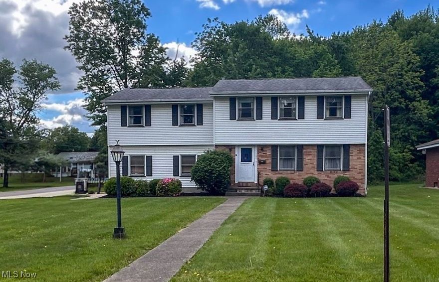 WELCOME HOME - Make this one yours with just a few tweaks!! One of Austintown's quieter neighborhoods nestled away from the rest....and if you need space, this house is for you.  4 bedrooms and 1 full plus 2 half baths await you and your family.  Enter through the attached garage and a half bath is right there for your convenience next to the eat-in kitchen.  A formal dining room and good size living room also make up the first floor.  Four roomy bedrooms with oversized closets await you upstairs along with a full bathroom. Notice the hardwood floors throughout.  You won't believe the size of the main bedroom!! There's plenty of room to turn the half bath into a full en suite and add a nice walk in closet.  House features a whole house fan to help keep A/C costs down.  Put your finishing touches in this dry basement and have some extra living space to enjoy.  Relax in your private fenced in back yard this summer and enjoy the peace and quiet of this lovely Austintown neighborhood.  Very close to schools, the library, shopping and restaurants. Updates: Roof between 10-12 years old, HWT-2015, Furnace 2020, Garage door just replaced, carpets just cleaned.