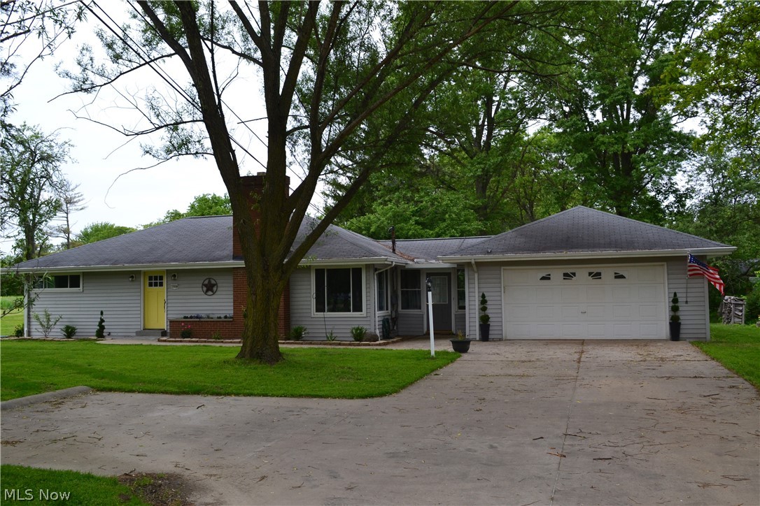 Beautiful ranch home with 3 bedrooms and 2 full bathrooms. Plenty of space in large family room to entertain and sit around the stone fireplace! New flooring throughout entire home. Kitchen is equipped with stainless steel appliances and granite countertops. Basement is half-finished with new carpet and a wet-bar area. Large sliding glass door leads out to a fenced in backyard with shed. Home is one of few that has access to Greenbriar Lake Association Membership where you can enjoy fishing, swimming, and other amenities. Garage is a handyman or handy-woman dream with a extra workshop in the back and the option to have it heated! Home will even include a home warranty! This home has too much to offer, make it yours today!