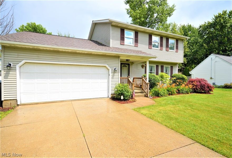 Welcome to this well-maintained colonial in Sheffield Lake! As you enter the front door, you will notice the spacious living room. As you walk through the foyer there is a powder room for guests. This updated kitchen with new floors and updated appliances is spacious and has oak Merlot cabinets. The family room is an open concept with access to the backyard deck. There is also a dining room on the first floor. The second floor is home to an extra large master bedroom with a private bathroom. There are two other bedrooms on this floor as well as a full bathroom. This home has a privacy fence surrounding the back yard for your convenience. This beautiful home is only blocks from Lake Erie and conveniently located! This home has been well maintained with updated appliances, furnace, sump pump, new carpeting and new floors throughout the kitchen and eat-in-kichen! Pride of ownership here!