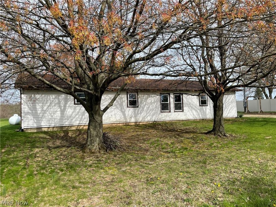 This one is a diamond in the rough.  Tons of potential and could be an investors dream.  There is a one bedroom efficiency apartment attached to the garage.  There is a fenced in back yard on a dead end street.  This is a manufactured home that has had an addition added to it doubling is square footage.  it has a owners suite in the addition.  in the main portion of the house there is a full basement under.  The laundry room in on the main floor.  There is also a room that can be considered an office next to  the kitchen.  This house is being sold "as is". Cash Only