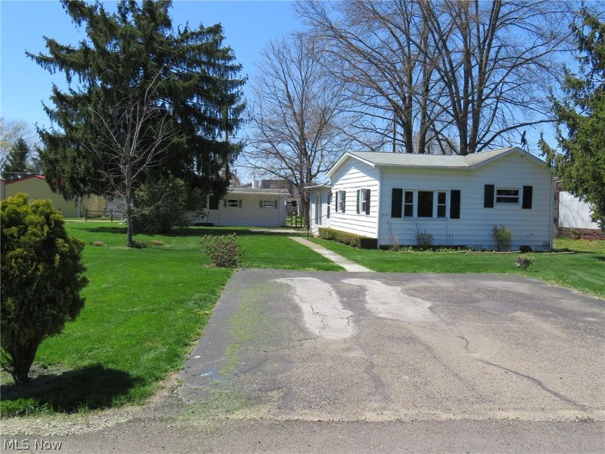 This is a unique set-up, two individual mobile homes on one lot.  One has two bedrooms and the other has one bedroom.  Both very well maintained.  Both have separate parking areas.  Both have ranges and refrigerators.