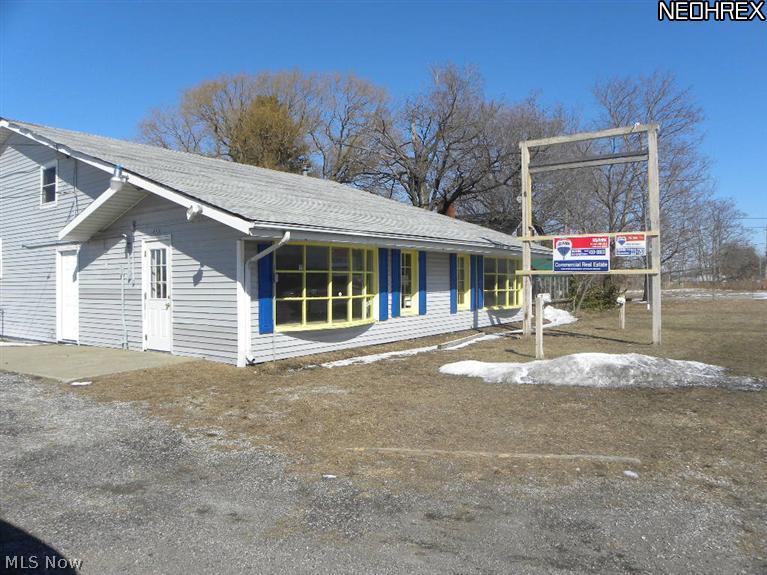 Don't miss out of a great investment opportunity with great cash flow potential. Commercial frontage along route 20(traffic count is approx. 36,000 on St Rt 20-N Ridge Rd) within one mile of Walmart!! Great location for your business or rent this commercial space. Building has two bedroom apartments in the rear. All on 17 plus acres. Property is being sold as-is with no guarantee's two parcels...Septic and Well. City water at the street. Two parcels, property with commercial building is .85, second parcel has home in need of TLC on 17 acres.