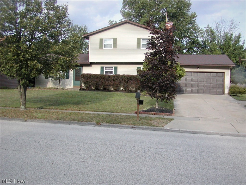 Lot: 90 X 150. Lake privileges available. Enjoy life by living in this roomy 4 bedroom 2 1/2 bath well maintained home in Wyoga Lake Estates. Applianced kitchen plus formal dining room with sliding doors to three season room to privacy fenced patio and sitting area. Great for a hot tub that stays but needs a pump & new cover. A gate leads to a large lot. 2 car garage with an extra 8' X 14' added to the back, Ceiling fans in many rooms. Updates include --Furnace--2014, Central air--2014, Hot water tank--2015, Tilt-in windows for easy cleaning--2008, Laminate flooring in most rooms. Master bedroom with private bath, wood burning fireplace in the family room. Cement crawl space under the house with loads of storage, first floor laundry. Lot in back goes to the large trees. America's Preferred Home Warranty included.