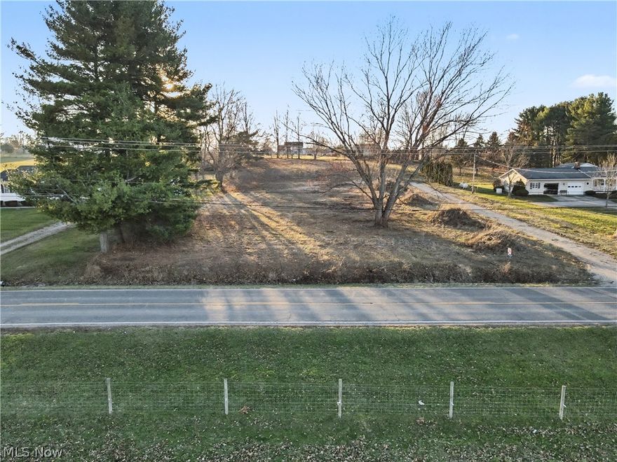 Ready to build? Beautiful lot on county road located in Rootstown. Soil tested and driveway is installed. Just waiting for a new home.