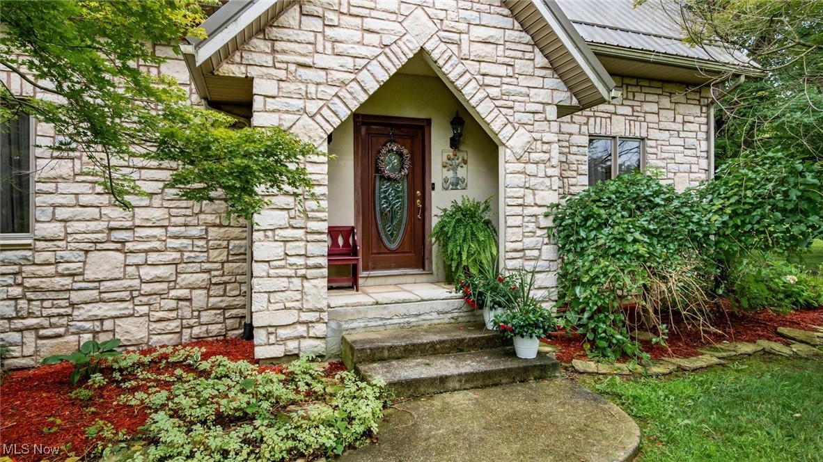 This stunning stone-front home, located in the highly sought-after Tri-Valley School District, is a must-see. Featuring soaring cathedral ceilings and a charming loft-style primary suite, this home combines comfort, character, and functionality.
Step inside to a warm and inviting living area, where vaulted ceilings create a bright, airy atmosphere. The spacious loft bedroom overlooks the main living space and offers a private retreat complete with a soaking tub—perfect for unwinding after a long day.
The property also includes an additional parcel, giving you extra outdoor space for recreation, gardening, or future development potential.
A large, full basement with a bedroom, a Recreation room, a bonus room, and a nice-sized utility area provides lots of storage potential.
For added peace of mind, recent updates include a new metal roof, HVAC, radon mitigation system, and an underground invisible pet fence that encompasses both parcels.
With timeless curb appeal, extra land, and thoughtful features throughout, this home offers the ideal blend of style, space, and practicality. Don't miss this one. Schedule your showing today