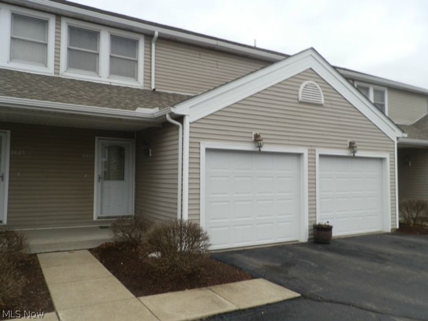 Fabulous CANFIELD Condo Priced to SELL! This Great 2 bedroom condo features a large open kitchen with breakfast bar, dining area, and Huge family room with wood floors with sliders to a deck-Just in time for summer! 2 large bedrooms and updated bath up. Full FINISHED Basement with family room and half bath! 1 car ATTACHED garage. Freshly painted and many updates to this beautiful unit! Call Now- it wont be around long!