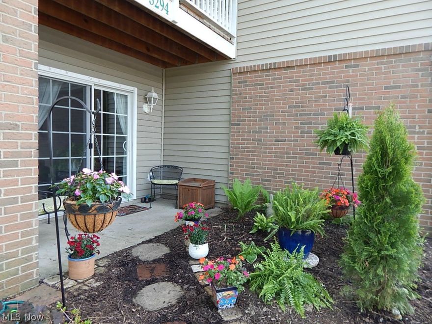 Spacious 3 bedroom, 2 bath first floor ranch condo in Lenox Village*Laminate floors in foyer, kitchen, hall and all 3 bedrooms*Nice size living room with gas log fireplace and sliding door to patio*Formal dining room*Step saver kitchen*First floor laundry*Master bedroom has a walk-in closet and master bath with a shower*There are 2 other bedrooms and another full bath*Freshly painted with neutral colors*New carpet in 2015*Furnace and hot water tank new in 2010*Great location with freeway access North and South and close to Summit Mall and many restaurants*Garage is near the unit*