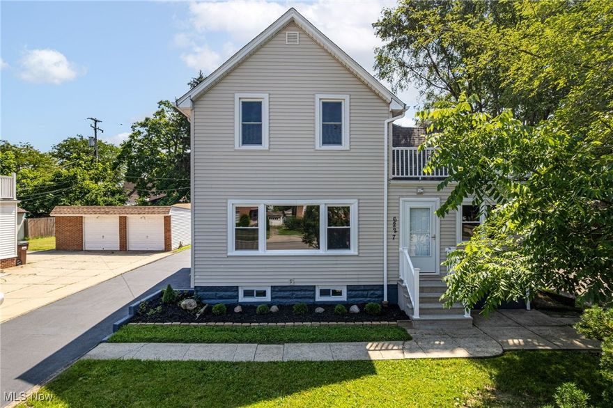Welcome to 6227 Ridge Road, a beautifully designed home in the heart of Parma, set back 70+ feet from the main road for added privacy and serenity. The first floor features a stylish kitchen with marble-style granite countertops, copper-toned backsplash and flooring, and stainless steel appliances. A walk-in pantry, full bathroom, and main-level laundry offer convenience and function. The open layout between the kitchen, dining room, living room, and foyer allows for effortless flow and connection, while a main floor bedroom provides privacy within the shared space. Upstairs you'll find a spacious master suite with its own full bathroom, sunlit areas throughout, and a private walk-out balcony. On the opposite side, three creatively arranged tandem rooms provide flexibility for bedrooms, office space, a nursery, or more. Outside, a long driveway leads to a three-car garage with a loft above—ideal for entertaining or hobbies. Located near major highways, shopping, and everyday conveniences, this home blends comfort, style, and practicality. Schedule a private showing today!