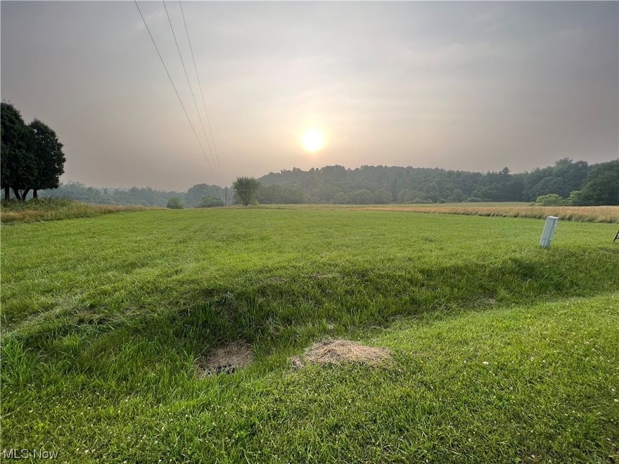 Beautiful setting in Sherrod Valley subdivision.  Half acre lot overlooking the neighborhood pond.  Scenic views abound!  Residents have access to the pond for catch and release fishing.  Atwood sewer available with a tap fee of $1,725 (as of 2023).  Buyer would need to install a private well.  Conveniently located off State Route 212, close to Atwood Lake.  Sherrod Valley restrictions include no mobile homes.