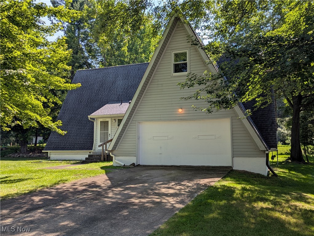 Picturesque 4 Bedroom, 2 Bath A-Frame Home with 2 Car Attached Garage overlooking the Canal. Home features Living room, Eat in Kitchen, Enclsed Porch, Full Unfinished Basement, Centrawl Air and so much More!! A-Frame windows have plastic inserts which are removable. Property is being Sold As-Is (Cash only).