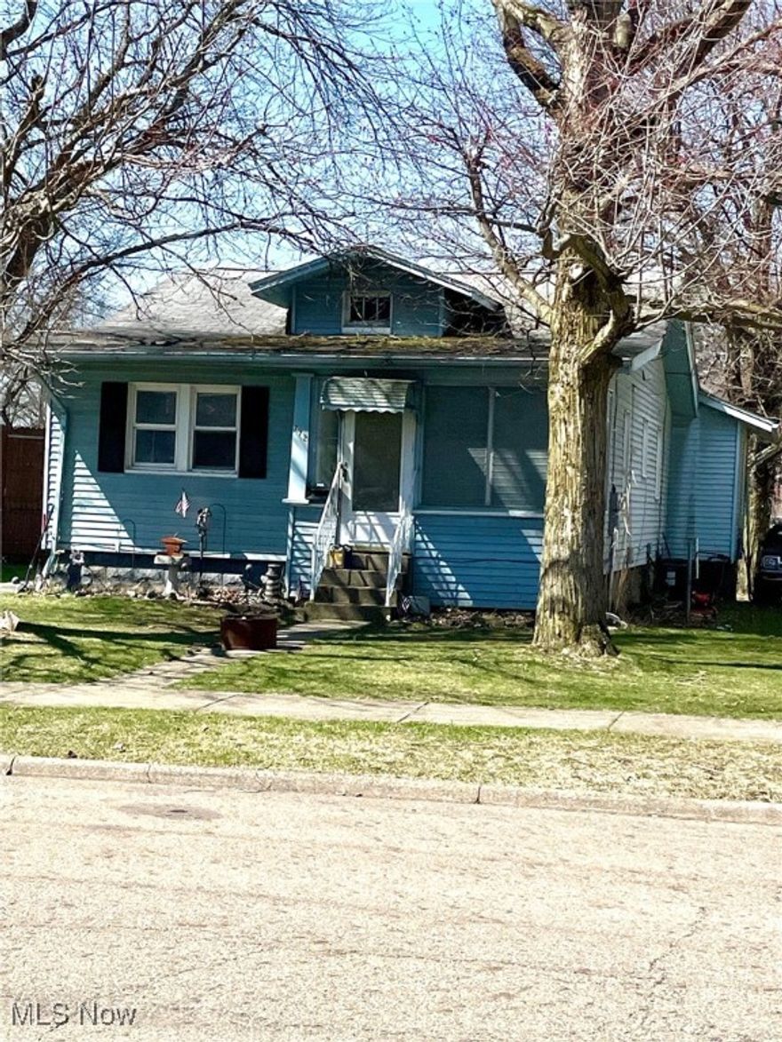 This home just needs a little more TLC. Home was tenant occupied. Take advantage of a great opportunity to make this home your own! This home has so much to offer! A HUGE finished basement that was waterproofed by B-Dry approximately 20 years ago. New sump pump installed this June. Glass block windows... some are vented. Enjoy summer days on your enclosed, screened porch with Jalousie windows! Central AC. Kitchen with wood cabinets, built in cooktop electric stove. Built in oven. Convenient mudroom/pantry off of back door & kitchen. Vinyl insulted windows. Detached 2 car garage has concrete floor. Garage door opener is not working. Easy yard to maintain. Priced To Sell. SELLER IS SELLING AS IS.
