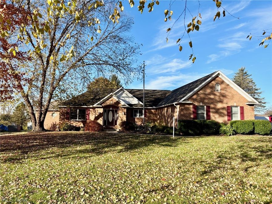Great opportunity to own a move-in ready beautiful brick ranch home sitting on 2 acres. This home offers 3 bedrooms, 2 full bathrooms, 2 half-baths, 2.5-car garage, and over 2,800 square feet of living space. The kitchen, living room and dining room flow nicely to offer a great space to gather and feel at home with a double-sided gas fire place, ample cabinets, and bar top seating. The living room leads to a cozy den/office space with beautiful wood floors and two bedrooms. Beyond the den is an enclosed sunroom which offers backyard views and a perfect place to relax in the large hot tub. The owner’s suite includes tray ceilings, amble closet space and an upgraded shower. The partially finished, 13 courses of block, basement includes an entertainment space, half-bath, bedroom, and an additional finished room. The exterior of the home provides a large back porch, an outdoor wood burner, and a storage shed with power and water.  Most of the home’s interior has been freshly painted.  Don’t miss the opportunity to make this beautiful property your new home!