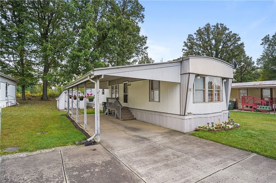 Welcome to Sebring Estates! This 2-bedroom, 2-bath home in West Branch Schools has been beautifully updated and is move-in ready. Enjoy peace of mind with a new roof on the and carport and newer roof on home. All new flooring with some updated sub-flooring, and a fully remodeled master bath. The master suite features two large closets and a spacious vanity, while the second full bath also offers plenty of room. The spacious kitchen boasts abundant cabinet space, hidden drawers for extra storage, and appliances new in 2020. A convenient laundry area with washer and dryer included makes daily living a breeze. Every room has been freshly painted within the last four years. Relax and unwind as this property backs up to a wooded area, providing extra privacy and a beautiful view. A spacious shed stays with the property, and a home warranty is also included for your peace of mind.