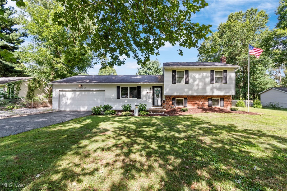 Check out this fully updated, spacious split-level in desirable Manchester LSD! The open-concept main level features a spacious eat-in kitchen w/island that flows right into the large 4-seasons room. Upstairs you'll find 3 bedrooms, a full bathroom, and another half bath that is attached to the master. Lower level features a living room, laundry room, and additional unfinished space for storage. Step outside to a generous patio w/gazebo and fully-fenced backyard. Attached 2-car garage. Schedule your private showing today!