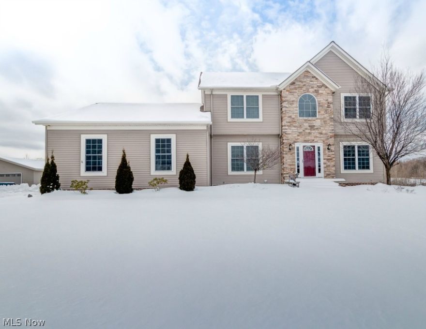 Beautiful 4/5BR, 3.5 B Colonial on 2.2 acres. Backing up to the Akron Watershed that cannot be built on, the home greats you w/a 2 story foyer, a 1st floor office to the left & a formal LR to the right. 1st floor has 9’ceilings, adding to the volume of the home. There is a formal Dining Rm w/tray ceiling, crown molding & dec. trim work. The spacious kitchen has oak cabinets, lg built-in pantry, stainless appliances & breakfast bar. The eating area overlooks a large Trex deck w/gorgeous views & flows into the vaulted family room w/stone FP & built in cabinets. Skylights add natural light to this lovely room. Laundry Rm has built in shelving & closet. All appliances remain, inc. washer & dryer. The finished lower level boasts walk out w/patio, full bath & additional office/playroom. The upper level boasts the vaulted master suite, walk in closet & 13x11 private bath includes a corner jetted tub, wrap around his & hers sinks & separate shower. There are 3 additional BR & a full bath. Ther