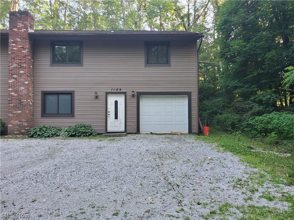 Rustic two story unit set back off the road in a peaceful wooded area. As you walk in the front door you will find a beautiful brick fire place with a brick accent wall. This home offers many new updates such as brand new lament flooring throughout, fresh coat of paint on all the walls, and updated bathrooms! The lower level features a great space that can be used as the main living room and offers a half bath. The main level offers an open concept living, newly updated kitchen that comes with a dishwasher, oven, microwave, and fridge. The dining area right off the kitchen has a sliding glass door that leads right out to the back deck, perfect for a morning coffee! With the two bedrooms and newly done bathroom and shower, this is a perfect home for anyone! All adult applicants must apply online. $50 nonrefundable application fee per adult applicant. We run credit, criminal, eviction history and verify income. No Section 8. Pets may be considered on a case by case basis for well qualifi