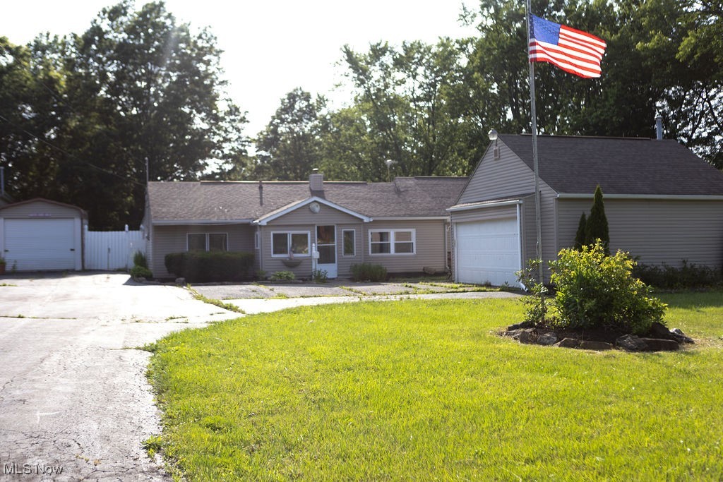 Come see this charming, updated Austintown Township home! The two-car heated garage and 3rd garage space being a pull-through building may be just what you have been looking for. Featured updates include: fresh paint (2025), kitchen, bathroom with walk in shower and LVP flooring in main living spaces (January 2024), new water heater (September 2023) and a new furnace (2019). Including two bedrooms, a bonus/office room, enclosed front porch and back room (was previously used to run a business out of). Many closets and attic space provide storage opportunity. Situated on nearly a half-acre lot and conveniently located near shopping, eating and interstate 80, this one is a must see! Property is zoned Residential on a Commercial Strip if you were looking to potentially have a business in this location.