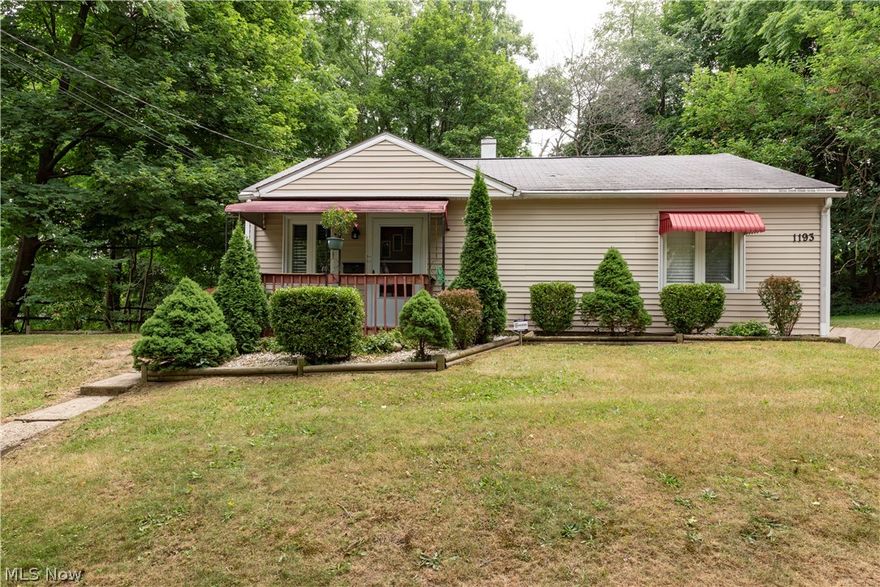 Check out this beautifully updated ranch in Akron's International District!  You're greeted by a large living room with beautiful luxury viny tile flooring and big picture window.  The eat-in kitchen features a gorgeous tile backsplash, modern cabinetry and stainless steel appliances.  Just off the kitchen is a utility room with HVAC and laundry.  First floor living at it's best!  The home has two nicely sized bedrooms with window treatments and luxury vinyl title flooring and freshly updated full bath (2021) with walk-in shower.  A large great room with vaulted and beamed ceilings (currently being used as a 3rd bedroom) and barn door separates the kitchen and garage.  The one and a half car garage with new garage door and opener (2023) offers plenty of extra storage space.  A large side yard and extra parking area next to the garage completes the home.  Just minutes from route 8, downtown and all the shopping and restaurants in the Chapel Hill area.  Call your favorite Realtor and schedule a private showing today!