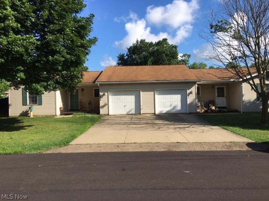 This just like new ranch style duplex is priced to sell!  Open floor plan, fully applianced kitchen, spacious living room, owner's suite has full bath and walk in closet.  First floor laundry, nice fenced backyard with patio.  Excellent investment.  So conveniently located!