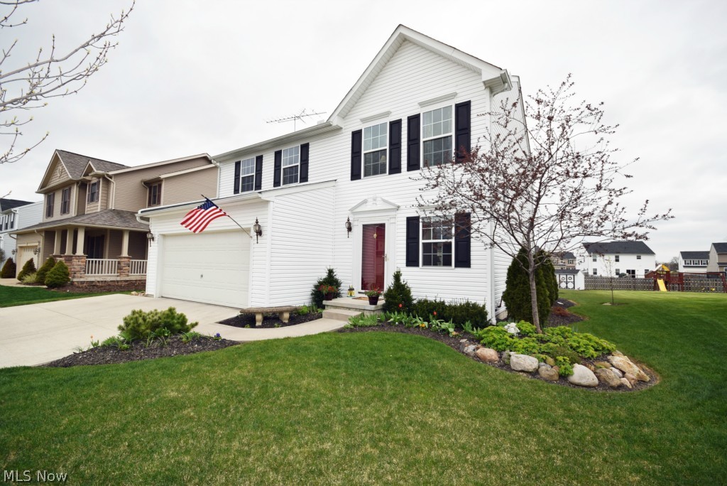 Built in 2009, this colonial in the Sterling Green neighborhood of Brimfield has a welcoming foyer which leads to an open concept floor plan with great room, dining room and kitchen. The kitchen features a spacious walk-in pantry and a butcher block island. A convenient mudroom off the attached two-car garage offers plenty of storage for outdoor apparel. A full basement offers endless possibilities for additional living space and storage and has been plumbed for a half bath. The upstairs features a master suite with walk-in closet and bath. Second floor laundry eliminates the need to climb stairs with heavy baskets. This home is move-in ready. This property features a large yard for all of your outdoor activities. It showcases an established lawn with beautiful landscaping and trees ready to be enjoyed as spring approaches from the comfort of the backyard patio and fire pit area. The property includes a 12'x10' shed for additional storage. This home is located close to the exciting new