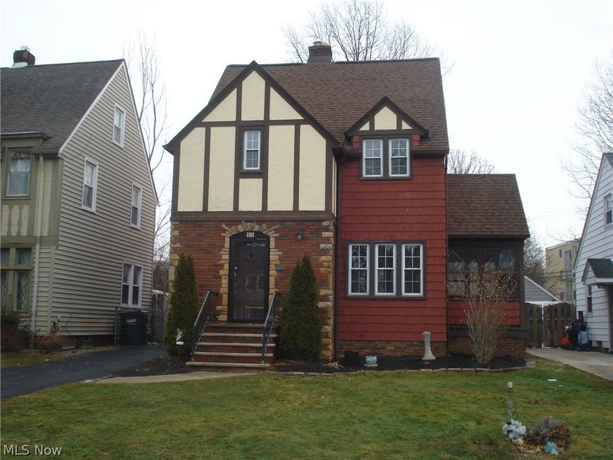 Welcome to Lakefront living at it's finest. Nestled on a quiet no-outlet street, this beautiful, well-loved Tudor home feels like something straight out of a storybook. Full of old-world character and storybook charm, it welcomes you with warm natural light, inviting spaces and a sense of comfort the moment you walk through the door. Imagine morning walks to the nearby park, sunset strolls by the lake, and quick trips on foot to local grocery stores and shops - the perfect blend of peaceful living and everyday convenience. With lake access through community membership and a neighborhood know for friendly welcoming neighbors. This is more than a home it's a place where memories are made. Thoughtful updates add modern peace of mind including an updated furnace, updated plumbing in the basement, kitchen and upstairs bathroom, brand new hot water tank, and new dishwasher. So you can settle in and simply enjoy. This Tudor style home offers 4 bedrooms 1 full bath and 2 half baths. The spacious Living room has a fireplace with access to the sunporch and abundance of natural light. The formal dinning room with built in china cabinet, flows into the kitchen with all the appliances and a conveniently located half bath. The second floor provides 3 bedrooms and a full bath, with the 4th bedroom located on the third floor.