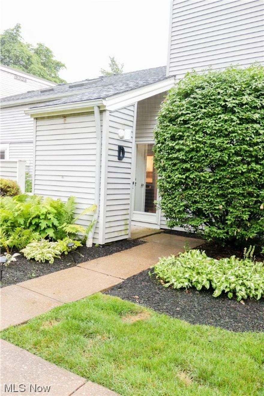 Enjoy carefree living in this wonderful end unit with a private entrance at Cedarwood Village. This unit overlooks lush green space and is just steps from its garage space. The living room has sliding glass doors to a private patio which is great for entertaining guests or relaxing in the evening. Great open floor plan with kitchen and dining room that opens to the living room area. The bedroom with skylight overlooks the living room and offers a large walk-in closet. Many updates have been done over the last few years including a remodeled kitchen, new carpeting, laminate flooring, full-size laundry space, and more! Right around the corner for I-90 and convenient to I-480. Walking distance to Crocker Park, various restaurants, and entertainment. Pool and tennis courts in the complex. Pets allowed. Subleasing allowed. Don't miss out on this beautiful condo!