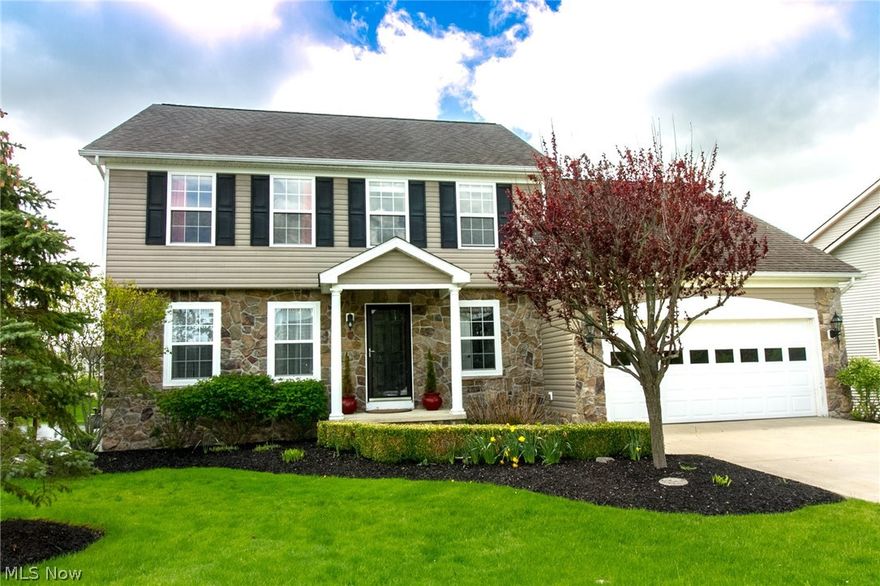 Exquisite Custom Colonial in the highly desired Fox Pointe development! 4 Bedrooms, 2 Full Baths AND 2 Half Baths with lots of room to entertain!  Step inside through the Front Porch into the airy Living Room with Coffered Ceiling and Gas Fireplace that richly opens into the Formal Dining Room and Eat-in-Kitchen.  The Gourmet Kitchen is stunning with Custom Cabinetry, Granite Counters, Stainless Appliances, and large Pantry.  Venture upstairs to a Master Suite with Master Bath and Walk-in-Closet!  You will find another 3 Large Bedrooms with lots of closet space and storage.  Bring your guests downstairs to the fabulously finished Walk-Out Basement complete with Wet-Bar and fantastic Media Room.  The Half-Bath is unbelievable with high-end finishes and tons of space.  Take a walk through the sliding doors out Back to the Patio & Large Deck w/ Views of Two Ponds and fountains.   Truly a breath-taking luxurious place to live.  Very close by Highland Trail Bike path.  Come make this amazin