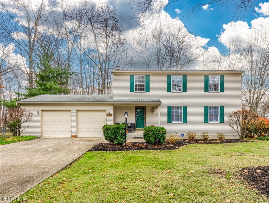 YOU WILL LOVE THIS SPACIOUS 4 BEDROOM COLONIAL WITH A LARGE DECK, GAZEBO, ATTACHED SUNROOM WITH VAULTED CEILING, AND LARGE FENCED BACKYARD. WITH A PARTIALLY FINISHED BASEMENT. GORGEOUS HARDWOOD FLOORS IN DINING ROOM, FAMILY ROOM AND KITCHEN. THE FURNACE WAS UPDATED IN 2017. THE KITCHEN HAS LOADS OF CABINETRY AND AN EATING AREA. THIS HOME WAS TAKEN CARE OF WITH LOTS OF LOVE AND CARE. YOU ARE CLOSE TO ROUTE 8, NATIONAL PARKS, AND WALKING TRAILS. YOU ARE MINUTES FROM MUNROE FALLS, TALLMADGE, HUDSON, CUYAHOGA FALLS, AND AKRON. IN BETWEEN TWO UNIVERSITIES, KENT & AKRON.