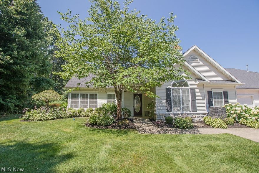 Spacious  ranch condo in Grand Manor Estates. Open floor plan with vaulted ceilings and gas fireplace. This unit has endless upgrades, large master suite with glamour bath, and large walk-in closet. The master bath also features a shower and a walk-in bathtub. Additional bedroom and full bath. Large kitchen with island and granite countertops. Kitchen cabinets are beautiful Brazilian cherry wood. Ceramic tile flooring throughout kitchen and formal dining area. In addition is a beautiful sunroom that has tons of windows that brings in natural light, great for relaxing and reading.  This home is handicapped accessible and is in a 55+ community that offers a large community center and workout room. This is an end unit in the cul-de-sac surrounded by beautiful landscaping and a private patio that’s great for entertaining. Also features a oversized 2 car garage. One of a kind. Immaculate.