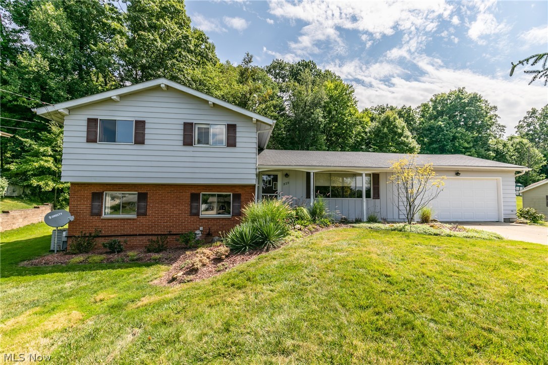 Lovely 3 level split in Macedonia on a ½ acre lot with the ledges and woods as a beautiful backdrop. This 4 bedroom, 1-1/2 baths home boasts a large living room, dining room and kitchen on the main level. The family room with wood burning fireplace, laundry room, ½ bath and 4th bedroom are on the lower level. The 4th bedroom has a walk-in closet and would be great as a guest room or office. Upstairs are three bedrooms and full bath. Hardwood floors in upper level bedrooms. This home is close to shopping, dining, medical and more. Recent updates include Furnace & Central Air 2020, half of the concrete driveway was replace in 2021. The rear yard is perfect for cook outs, and outdoor activities, with plenty of space for children and pets. Sellers providing a home warranty through Americas Preferred HW, downloaded in MLS. Point of sale completed and passed by city.
