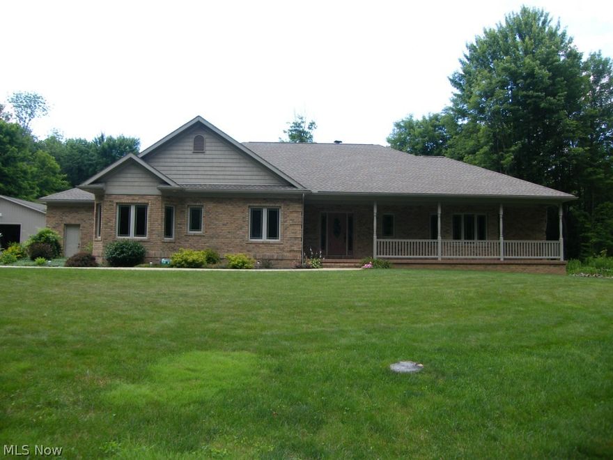 This gorgeous and cozy 4 bedroom custom built 4 bedroom, 2.5 bath, 2125 sq/ft ranch home is located pm almost 2 1/2 acres on a quiet country road with a large stocked pond. This home is the perfect size for everyone, with enough room for a private office or guest room that has its own entrance. The master suite is complete with a soak-er tub, walk-in shower and a large walk-in closet including built-in shelving for extra storage and more than enough room for hanging apparel. The amenities include a large fire place with a wood insert that easily heats the entire house in the winter, great views of the property from most every vantage point, window seats in the master suite and bedroom #2 and so much more. The kitchen is complete with custom cabinetry, and top of the line appliances. this beautiful home also comes with an attached 3 car garage along with a 36x52 1800 sq/ft workshop with front and back overhead doors and 12' ceilings. Come see the beautiful views of this property from th