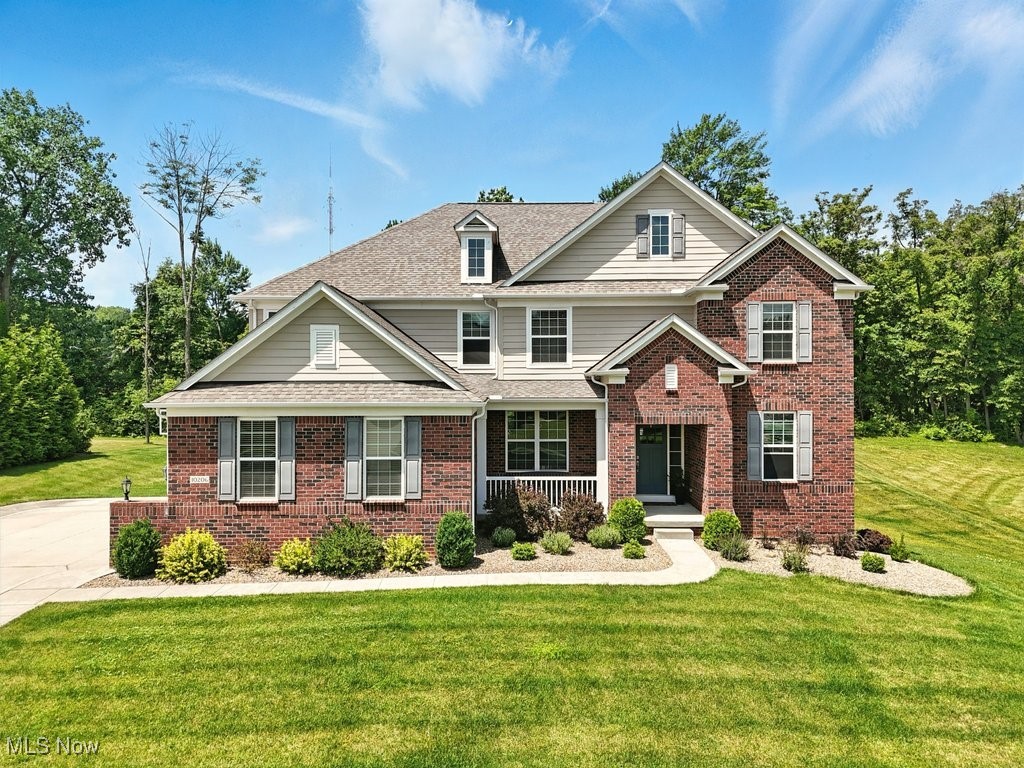 Welcome to one of the most sought after addresses in the area, The Woodlands of Brecksville. Boasting over 5600 SF of finished living space, this 5 bedroom, 4 FULL bath residence is ideal for both casual daily living and more formal gatherings and entertainment. As soon as you enter the front door, you are welcomed with beautiful hardwood floors throughout the first floor. The soaring ceilings in the great room, floor to ceiling windows, and gas fireplace allow all four seasons to be enjoyed from the comfort of your home. The custom, gourmet kitchen boasts granite countertops, upgraded stainless appliances, including a commercial gas range and hood, as well as a spacious island with pendant lighting. The vaulted breakfast room is surrounded by windows and offers access to the composite deck, overlooking the .80 acre parcel! One of the most versatile features of this home is the first floor bedroom/office with full closet, adjacent to a FULL bathroom! Large first floor laundry room, walk-in pantry, mudroom, and planning center complete the first level of this spectacular home. As you go up the stairs to the second floor, you will notice the custom handrails and finishes that were upgraded at the time construction. The owners’ suite offers a sitting room, walk-in closet and glamour bath! One of the best features of this floor plan is the 15x12 flex/bonus room on the second floor! A Jill and Jill bath flanked with bedroom on each side, plus an additional guest suite complete the second floor of this home. Wait, there’s more! The lower level has been completely finished and includes large daylight windows, and is prepped for a full bath! Additional features and upgrades include: professional landscaping, irrigation system throughout the property and beds, and professional grade landscape lighting. Do not miss this opportunity, just minutes from Valor Acres, downtown Brecksville shopping & dining, Metroparks, CVNRA, PLUS I-77, convenient to Cleveland & Akron!