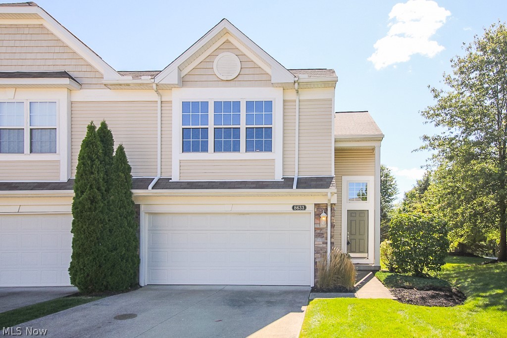 Beautiful end-unit townhouse in Olmsted Township. Freshly painted throughout with new carpeting, new laminate flooring and brand new kitchen appliances, this home is move-in ready! As you step into the stately 2-story foyer, you are welcomed home with an abundance of light. Step down into the spacious main living area which has lots of windows, high ceilings and features a fireplace for added ambiance. The dining room has a brand new chandelier and is connected to the kitchen and great room and has sliding doors onto your private patio. Wonderful kitchen with new stainless steel appliances and plenty of cabinets and countertop space. Fabulous open floorplan is great for entertaining or everyday life. A half bath and storage closet which could be converted into large pantry round out the first level. Upstairs, your light-filled over-sized master bedroom suite awaits with cathedral ceilings, a large walk-in closet and private master bathroom with large vanity and a shower/tub com
