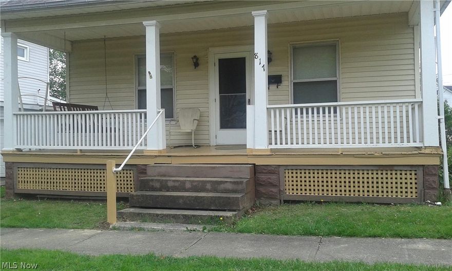 This cute little house has 2 bedrooms, 1 bath.  Home is adorned with a cute little front porch, not to mention a back patio area! This house is located on a quiet street! Detached garage is out back behind the house.  Home currently has a tenant in it and has been there for a couple of years.