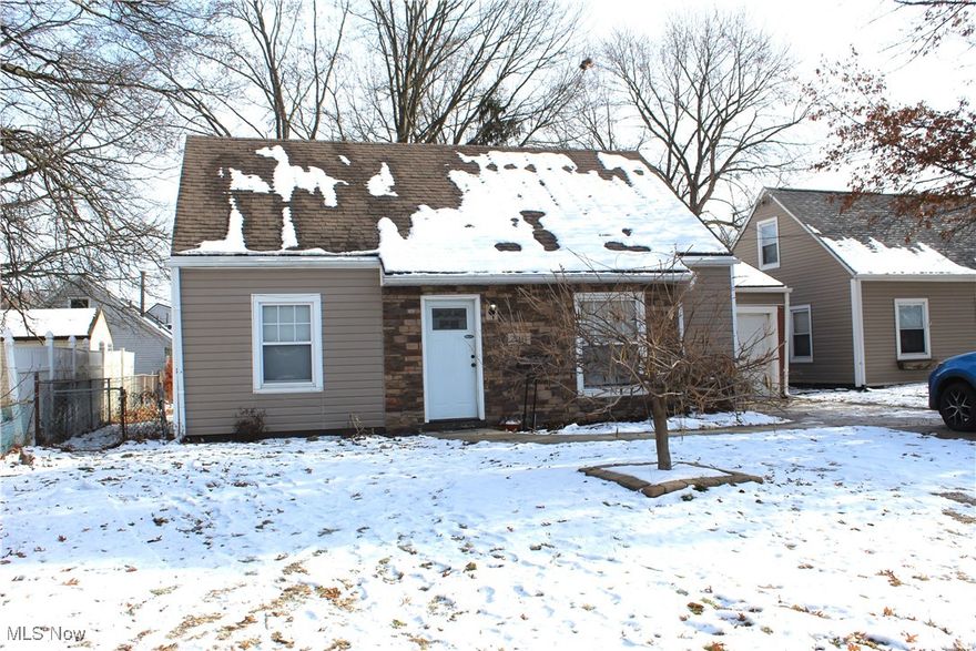Welcome to your new sanctuary where comfort meets character in this charming four-bedroom, one-bathroom home offering 1,120 square feet of thoughtfully designed living space, with all brand new flooring. Step inside to discover large, airy bedrooms that practically beg for your personal touch, while the updated kitchen serves as the heart of the home with modern conveniences that make meal preparation a joy.

Natural light flows throughout the interior, creating a warm and inviting atmosphere that changes beautifully with the seasons. The real magic happens when you step outside to the covered rear patio, your personal retreat for morning coffee or evening relaxation. The fenced backyard provides privacy and security, perfect for pets, children, or simply enjoying your own slice of outdoors.

Entertainment possibilities abound with the included fire pit area, ideal for cozy gatherings under the stars or roasting marshmallows on crisp autumn nights. The garden space offers green-thumb enthusiasts the opportunity to cultivate their own fresh herbs, vegetables, or flowering displays.

Location truly matters here, with Cuyahoga Falls High School just over a mile away, making school commutes refreshingly simple. Daily necessities are conveniently handled with Acme Fresh Market and shell gas station nearby for grocery runs, while River Front Park offers scenic walking trails and recreational opportunities for the whole family.

This property strikes that perfect balance between indoor comfort and outdoor adventure, all while keeping you connected to essential community amenities. Whether you're hosting backyard barbecues, tending to your garden, or simply enjoying the peaceful covered patio, this home invites you to create lasting memories in every season.