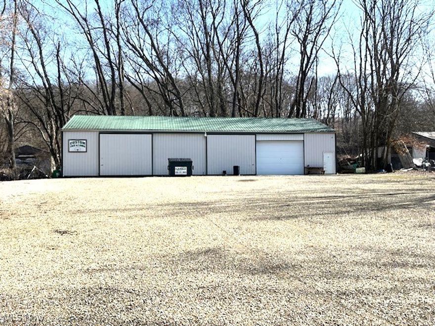 Renovated 80x60 pole building w/4800 sq.ft. and 2-12ft high bays. Built by Creary and renovated by owner using Amish contractors. Builiding situated on .7025 acres totally fenced in. Newly graveled yard with open area for turning equipment. Slab drive entering building, concrete floors, insulated gas heater, hot water tank (approx 8 yrs), well pump, metal roof, wired for 220 amp & new gutters. Second half of building is cold storage. Separate office building features 2 offices (14x36/400 sf) newly constructed in 2016 with knotty pine paneling and cathedral ceiling. Security cameras on pole building and office.