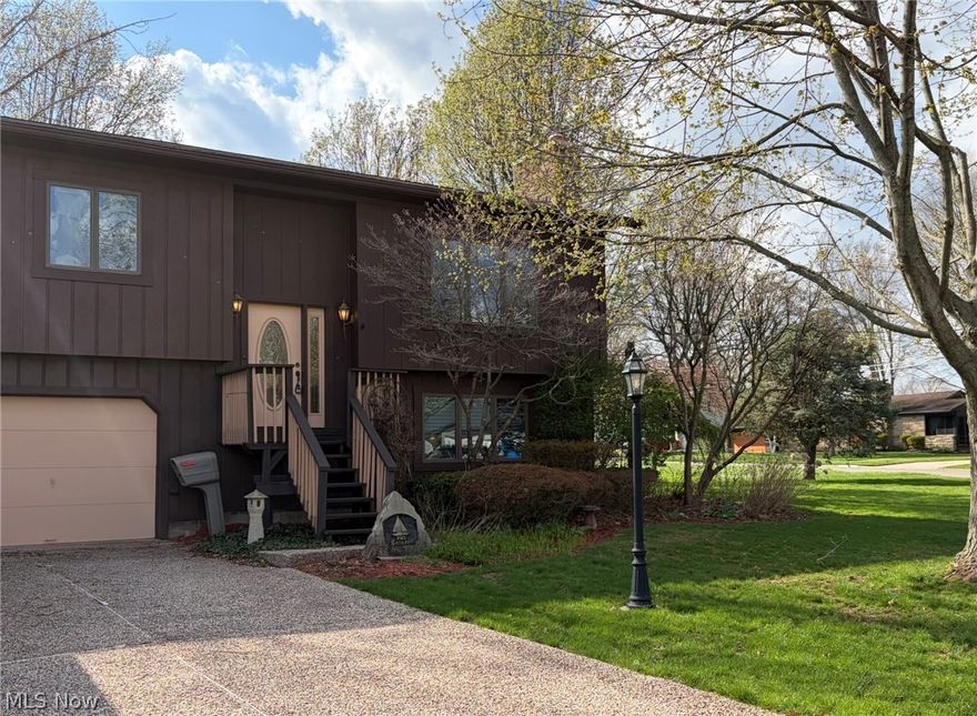 Welcome home to the West Side! Tucked away in one of Barberton’s most peaceful, established neighborhoods, this charming three-bedroom, two-bath bi-level is ready for its next chapter. This home has been loved by the same family since the day it was built, and you can feel that care the moment you walk through the door.
We’ve taken care of the big things so you don’t have to. It is fresh and modern with brand new carpet (2026) and refreshed flooring and countertops in the kitchen and baths. It gives peace of mind as it boasts a total roof replacement and a cozy new wood-burning fireplace (both 2025). And it is low maintenance as the exterior of the home features a fresh coat of Rhinoshield (2025) designed to look great for years, plus a high-efficiency heat pump and a massive 80-gallon hot water tank to keep utility bills low and showers warm.
Spend your spring mornings on the private back deck overlooking the lush, mature landscaping. Between the spacious two-car garage and the sturdy Amish-built shed, you’ll never run out of room for hobbies or storage. This is a clean, smoke-free, truly move-in-ready space. Come see why this house has been so cherished for decades—your family might just be the next to fall in love!