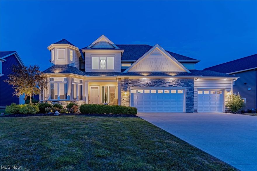 Unbelievable turnkey property custom-built by Miller Homes with incredible upgrades including: smart living features, first and second floor primary suites, Carrera marble baths, first and second floor laundry, upstairs loft, playroom and a chef's kitchen! Hickory floors flow throughout the main living area, where soaring ceilings, exquisite molding, and designer light fixtures set the tone for the home. The massive kitchen features an oversized island, a full suite of appliances including a wine cooler, and high-end cabinetry. Sliding doors open to a patio with a natural gas hookup for easy al-fresco cooking and dining. With five bedrooms including two primary suites, this home allows for first or second floor living with laundry and abundant storage space on each level. Two bedrooms are on the first floor, and three bedrooms can be found upstairs. The second floor loft is the perfect backdrop for cozy family gatherings, and the bonus room could be set up as a home office or sixth bedroom. The lower level provides an additional 2300 square feet with plumbing for another bath. It is just waiting to be customized into the home fitness center of your dreams. Situated on a large lot with a water view, this home has access to all of the amenities of the community, including a pool, athletic courts, and year-round social events. Minutes away from premium shopping destinations including Pinecrest, just moments from highways in parks.