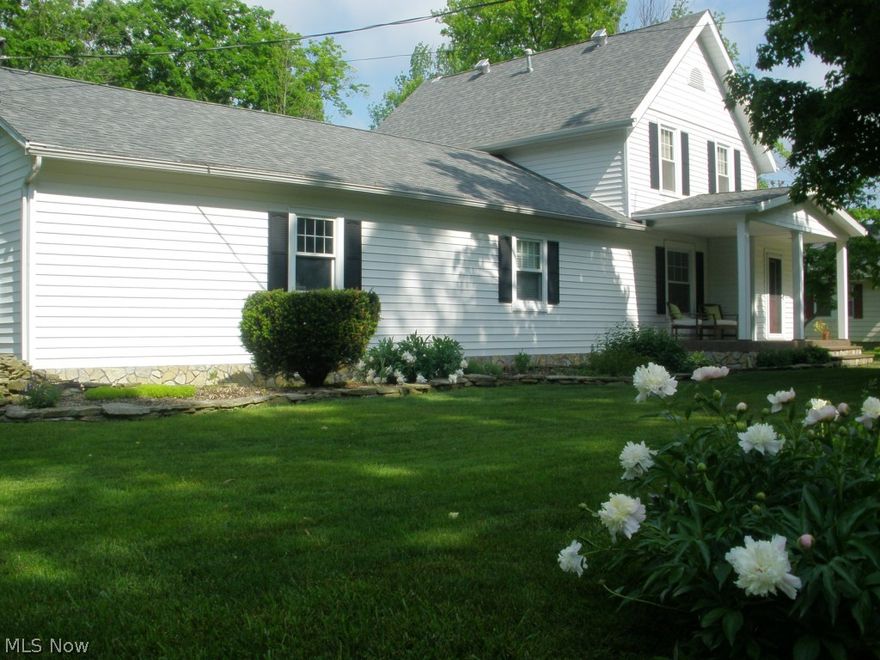 Situated on a gorgeous 1.21 acre river front lot in Carlisle Township, this century home has been completely renovated for today’s lifestyle. The new composite front porch welcomes you to the gracious formal living and dining rooms with crown molding, chair rail and exposed brick chimney. The kitchen includes new appliances, new cabinet fronts and a beautiful wood ceiling. Watch your favorite movie in the cozy family room. The first floor master is adjacent to the updated full bath with ceramic tile shower. An office area and craft/laundry area complete the first floor. The second floor boasts wood transom architecture, more exposed brick, two additional bedrooms and a new spa-like full bath with whirlpool tub and ceramic tile shower. Updates include complete electrical re-wiring, new furnace and A/C, new septic system, new roof and gutters, newer windows, new siding and waterproofed basement. Huge attached garage and concrete RV/boat pad for all your toys. A picture perfect home!