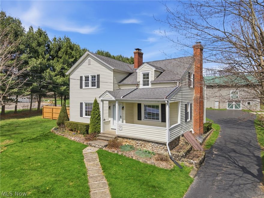 Immaculate & well maintained (1857) Century home with a 1008 addition built in the 1940's totaling 1906sqft of living space on 2 levels. A few of the awesome features include: Maple, Oak & Pine floors (oak under bedroom carpet), wood burner in 18x28 living rm, dining room between the kitchen and living rm + kitchen including all appliances (stove, fridge, micro and dishwasher), 1st fl bedroom, spacious full bath on the 2nd floor with tub/shower combo and located next to the huge primary bedroom that has 2 wide dormers and 2 closets, One of the other 2nd floor bedrooms has a cedar closet, there is central air, in 1998 thermal pain E-glass windows were added with a life time transferrable warranty, coved front porch, enclosed back entry porch, transferrable leaf guard system for life, gas hot water tank new in 2024, forced air gas furnace serviced regularly, electric softener system that does not require salt, work benches stay in the walk up basement & outbuilding. Outside you will find a 25x28 patio that was poured with footers to be able to convert to a det garage by back entry. The well was dug deeper (67') in 2025 and the septic leach lines are switched regularly. The 2 (7'h x 10'w) overhead doors give you 2 bays to pull your vehicles into the large barn/outbuilding. The original 40x30 flat barn was built in 1901 with a tall 2nd floor hayloft with the hay door out front above one of the overhead doors. The 2nd overhead door is on the side of the 28x25 lean to that was added onto the barn in 2006. There is a small shed for your gardening tools for the wide open yard. The 4.59 acres has trees along the property edges and an area about 1/4 of the yard wooded to the East of the parcel.  All of this close to the quaint Village of Burton that has shops, restaurants, a maple sugar house and Century Village which holds many events.  The cherry hutch and corner cabinet in the dining area can be purchased separately as well as many of the items in the barn.