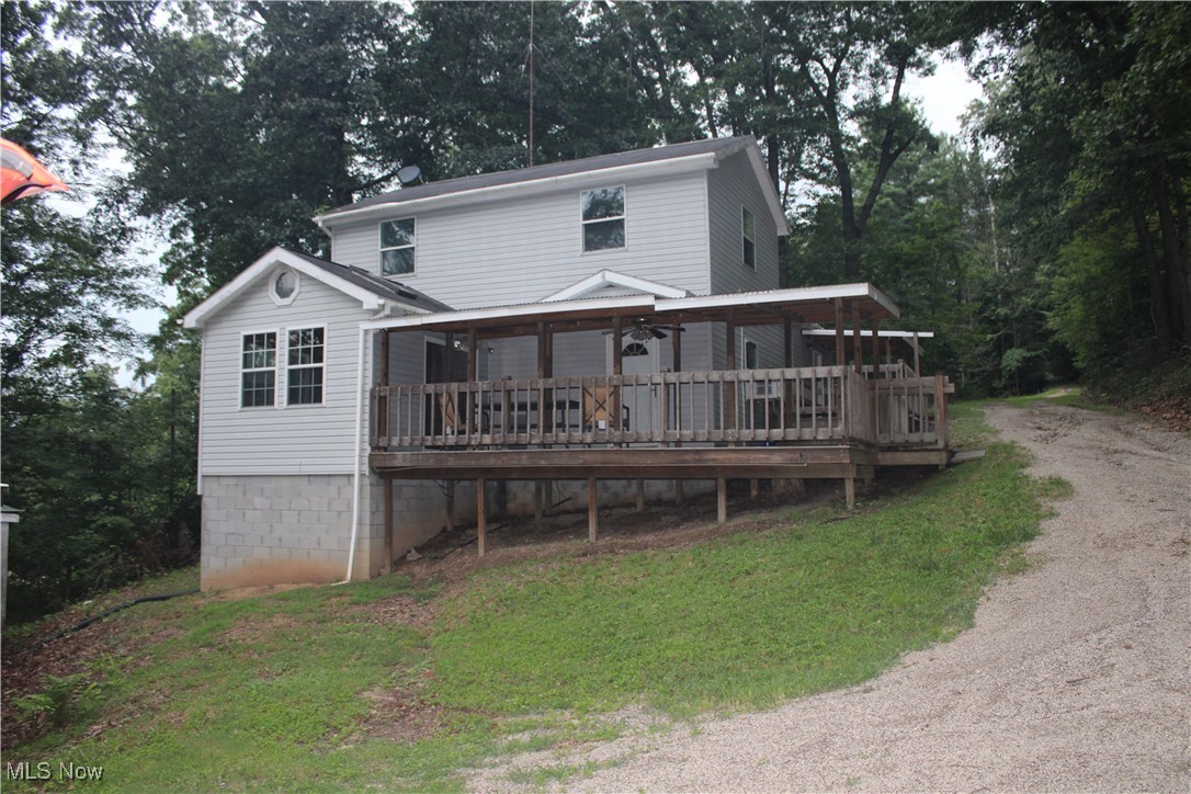 Charming 2-Bed, 2-Bath Summer Retreat on Private Drive – Just ½ Mile from the Lake!
Escape to your own slice of paradise with this beautifully maintained 2-bedroom, 2-bath summer lake house, nestled on a quiet private drive just half a mile from the water’s edge. Whether you’re seeking a peaceful weekend getaway or a full-time retreat, this inviting home offers the ideal mix of comfort, privacy, and lakeside charm.
Inside, you'll find a bright and open living space with large windows that let in an abundance of natural light and offer views of the surrounding trees. The kitchen features plenty of counter space and cabinetry—perfect for preparing meals after a day on the lake.
The two spacious bedrooms and two full bathrooms offer comfort and convenience for family and guests. A detached garage provides great storage space for lake gear, tools, or parking, keeping everything organized and out of the elements.
Step outside to enjoy quiet mornings on the covered porch or gather around the deck in the evenings. With mature trees, peaceful surroundings, and a private drive, this home offers the perfect setting to relax and recharge.
Key Features:
2 Bedrooms, 2 Full Bathrooms
Bright, open living and kitchen area
Detached garage for storage or parking
Covered porch
Private drive in a quiet, wooded setting
Just 0.5 miles from the lake
Don’t miss the opportunity to make this charming lake house your own. Schedule your private showing today and start making memories by the water!